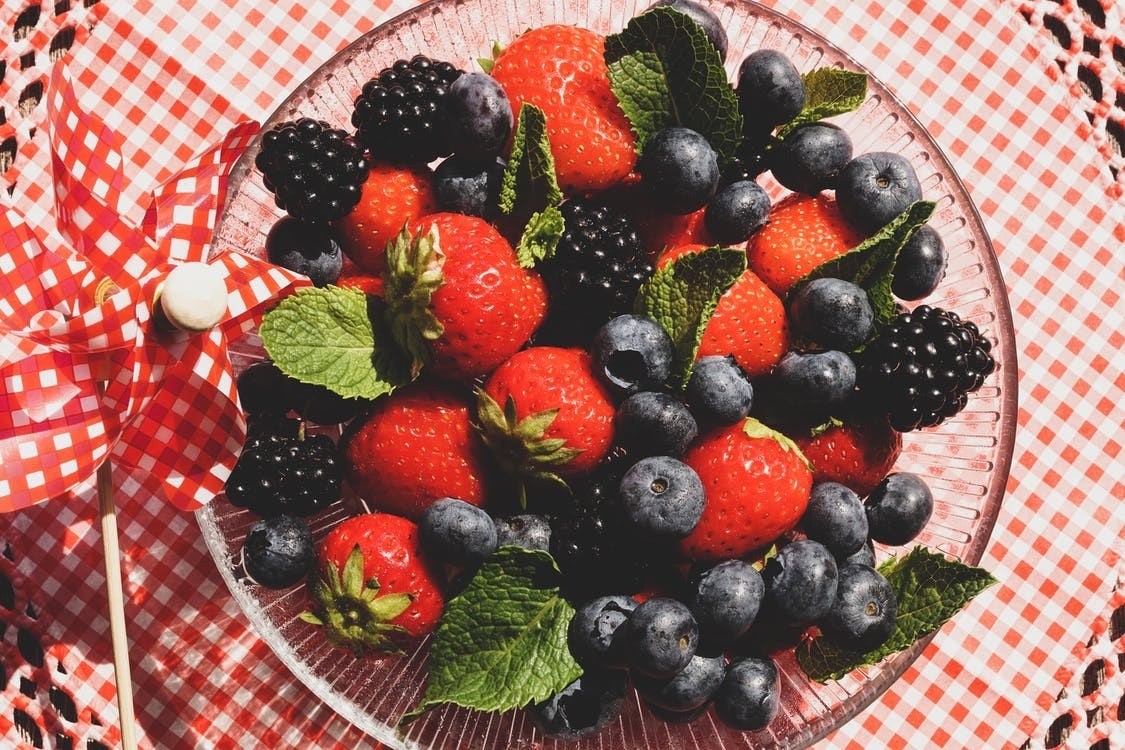 Strawberries and Blueberries in A Glass Bowl