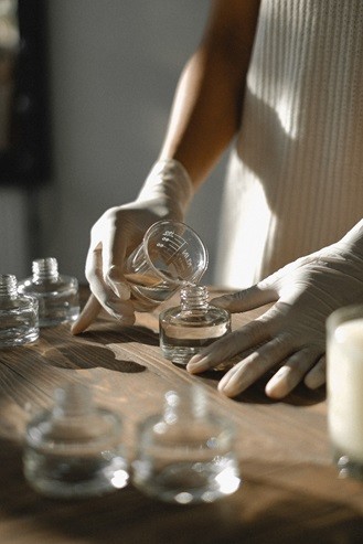 A person making aromatic liquid