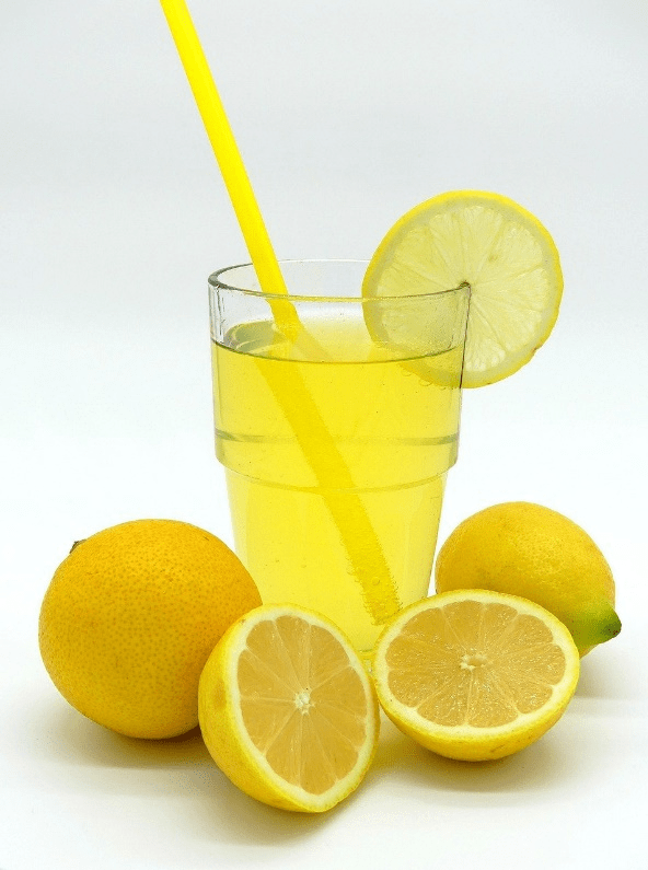 Picture of a glass of lemonade and lemons