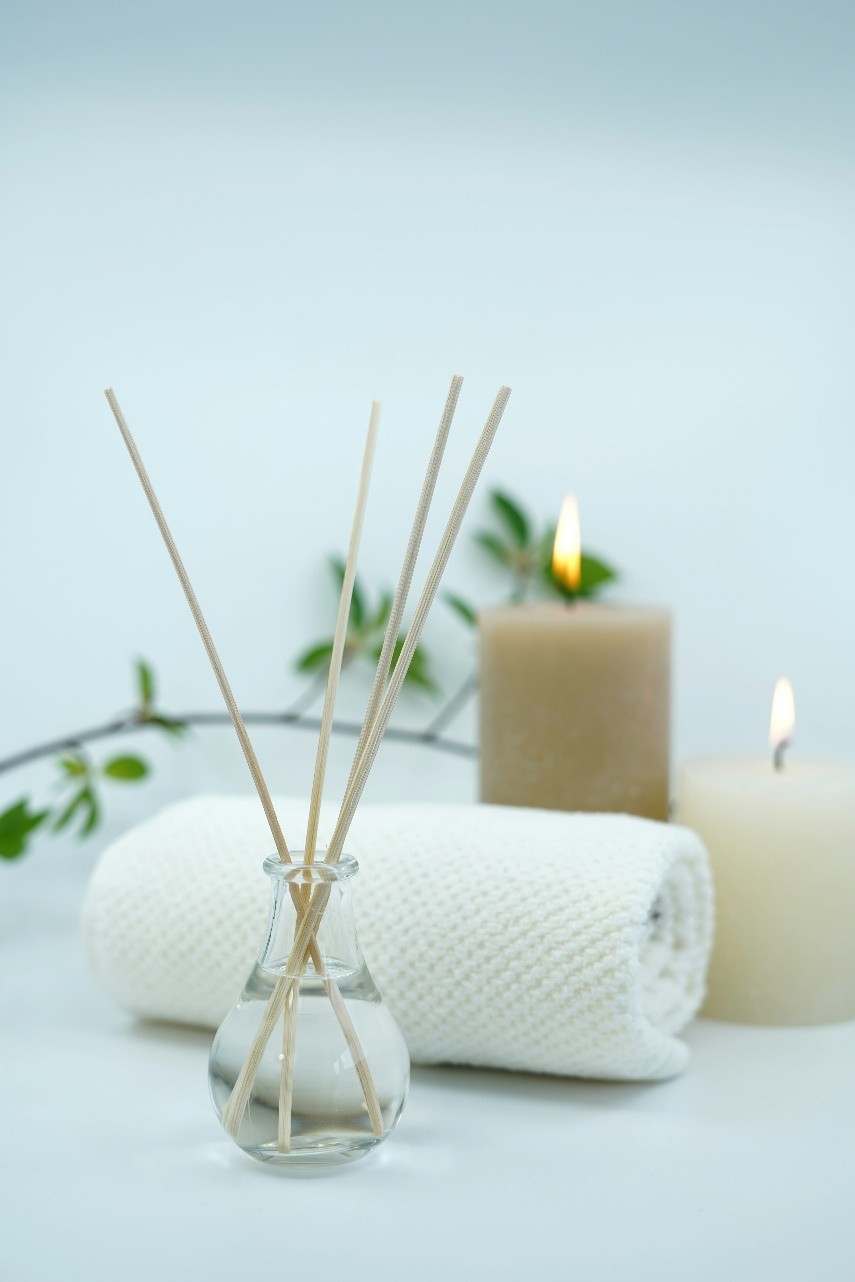 a towel and candles in a spa