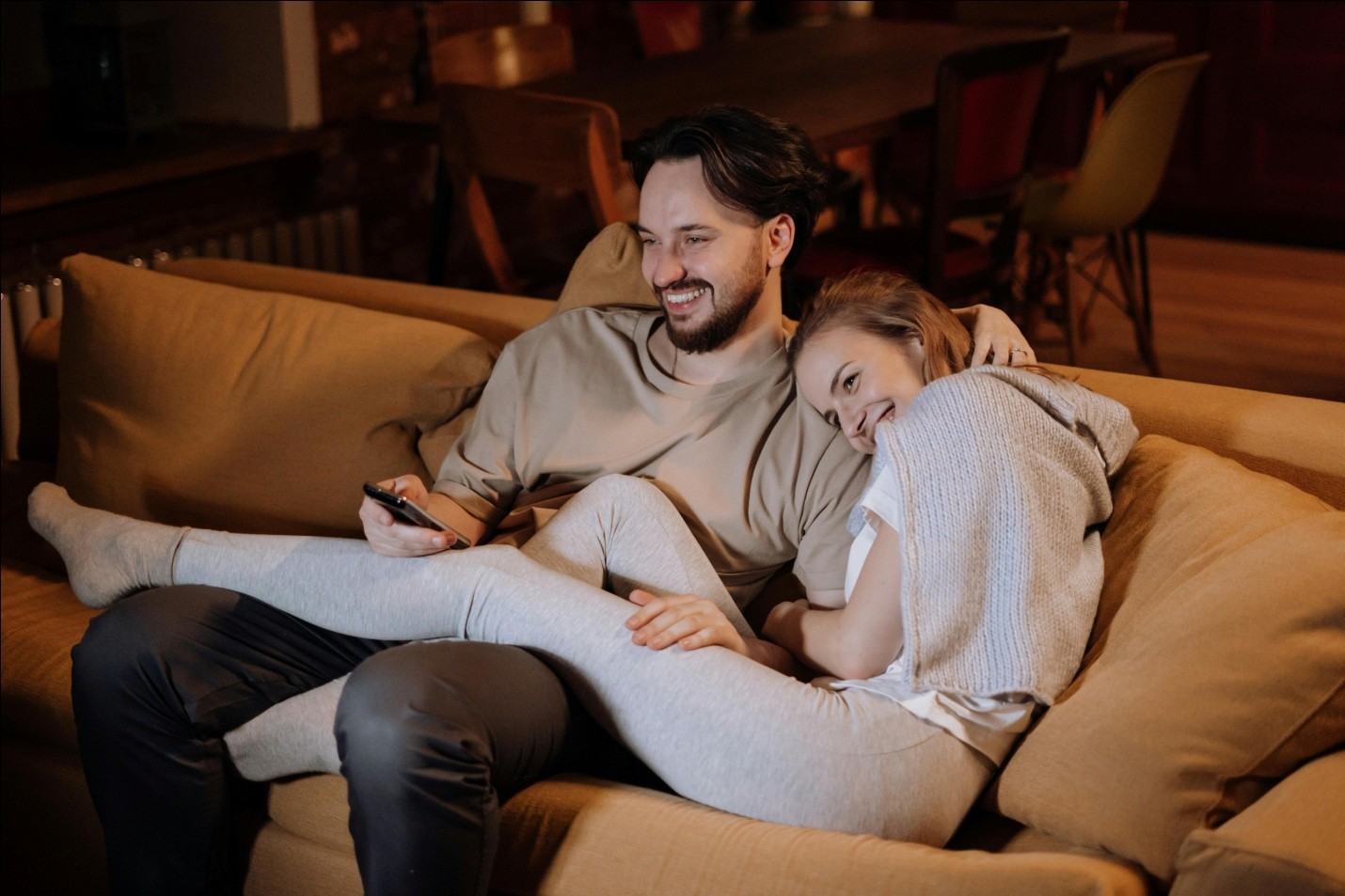 couple sitting on a sofa