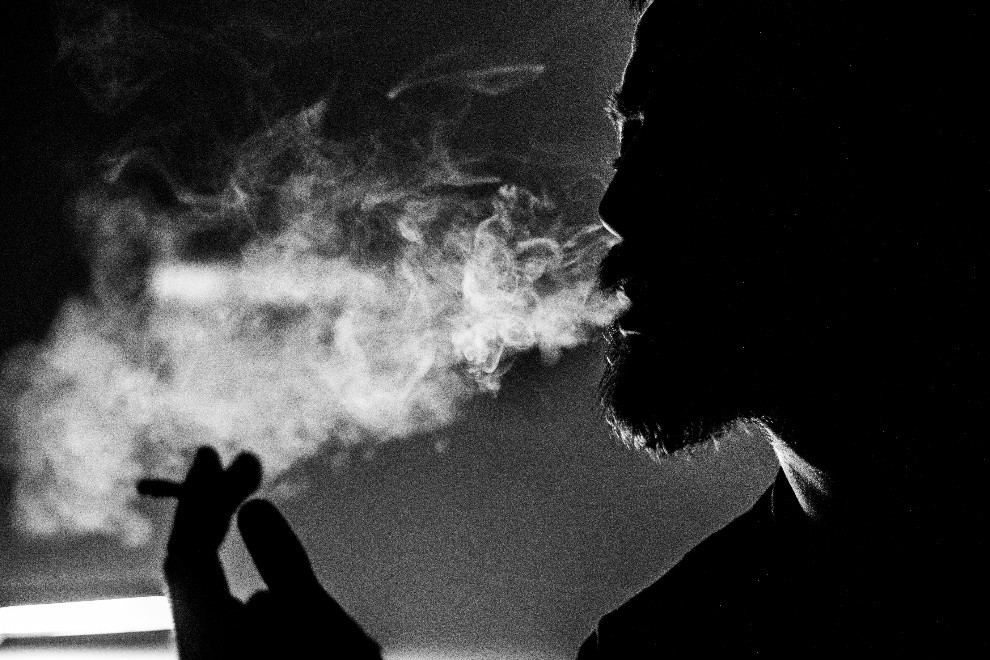Bearded man smoking