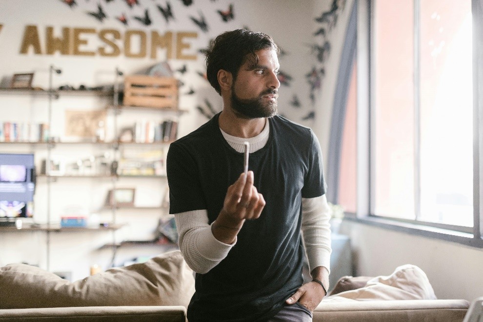 A person holding a cigarette