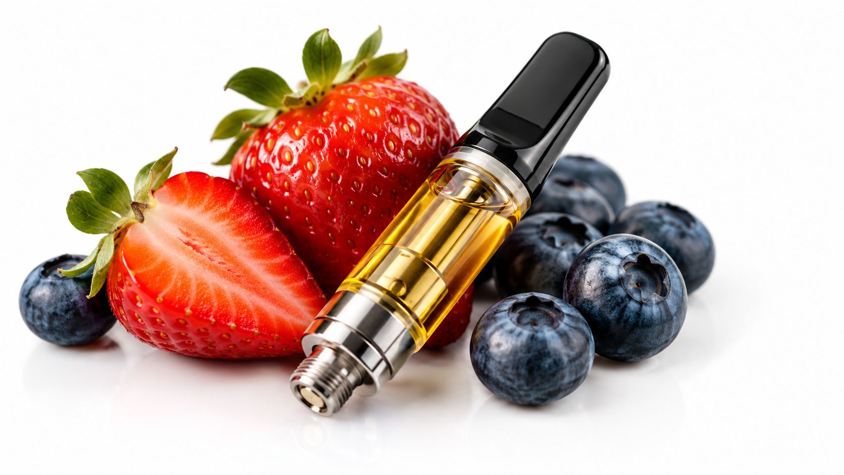 A premium vape oil cartridge surrounded by fresh red strawberries and blueberries on a white background.